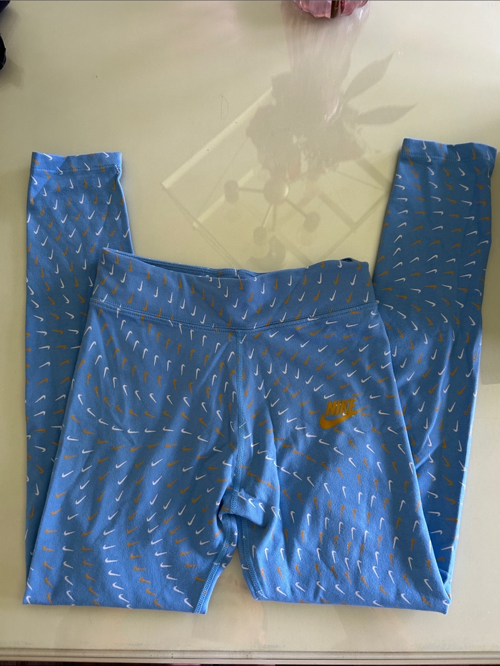Nike Kids Light Blue Leggings with Gold & White Swoosh Print